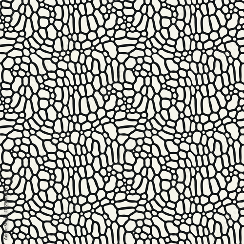 Vector seamless pattern. Free form organic shapes. Stylish structure of natural spots. Hand drawn abstract background. Can be used as swatch in Illustrator. Monochrome confused print.