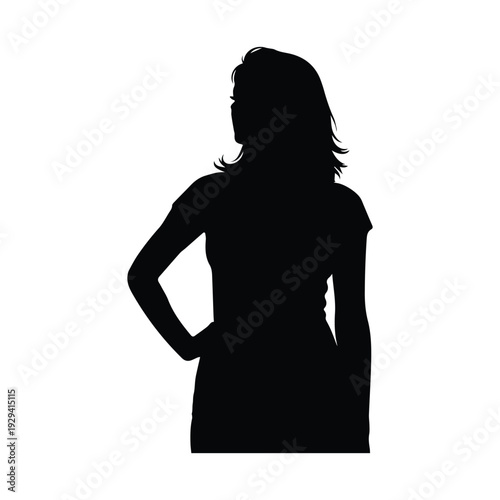 Confident woman standing with hand on hip in elegant silhouette