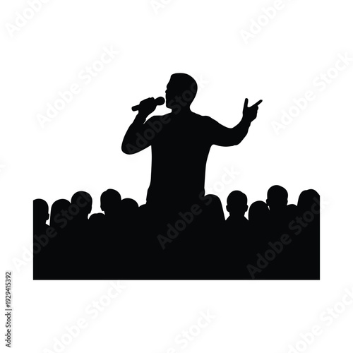 Silhouette of a charismatic performer engaging a captivated audience with a microphone