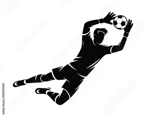 Dynamic silhouette of a soccer goalkeeper diving to catch a ball during a game