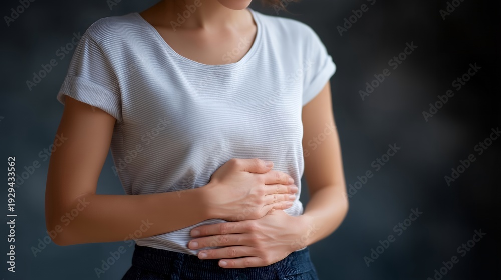 custom made wallpaper toronto digitalGut brain connection concept with woman holding abdomen and head simultaneously showing digestive and mental link, perfect for microbiome health, gut health awareness, holistic wellness, modern