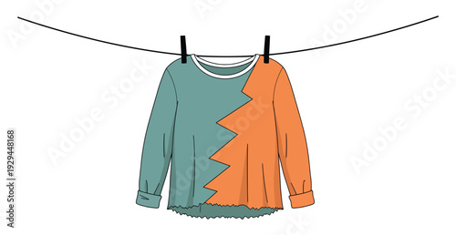 Vibrant torn shirt hanging on clothesline with unique jagged design