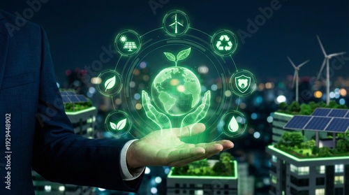 Businessman holding glowing digital globe with sustainability icons over green city at night
