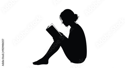 Silhouette of a woman sitting cross legged reading a book in a relaxed pose on a plain white background