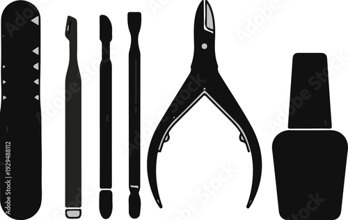 A collection of manicure tools and nail polish bottle