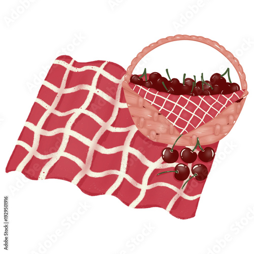 A basket full of cherries on a picnic table