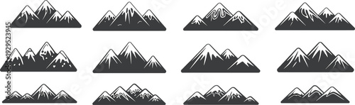 Twelve black and white mountain range with varying peak shapes and snow patterns peaks