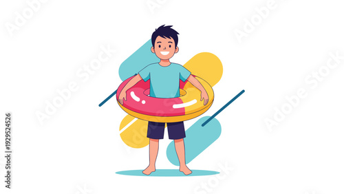 Smiling young boy wearing blue shirt and shorts standing with colorful inner tube ready for swimming and summer vacation fun.