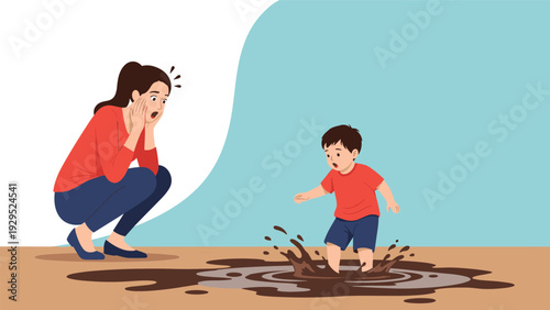 Shocked mother looking at her young son jumping into a messy mud puddle and splashing dirty water during playful outdoor activity.