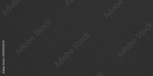 Black leather texture background with subtle natural grain, professional dark matte faux leather surface for design