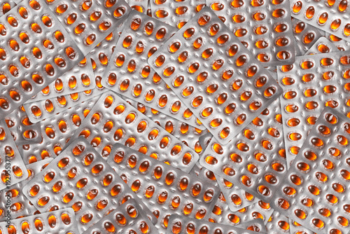 Fotografie Orange pills texture