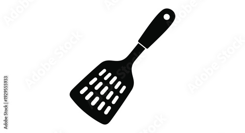 A stark black spatula is displayed against a white background showcasing its functional design as a kitchen tool silhouette