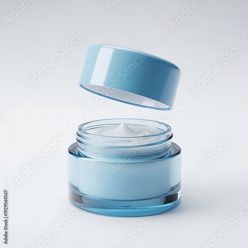 Floating lid over a blue glass moisturizer pot filled with luxurious white face cream in a bright setting.