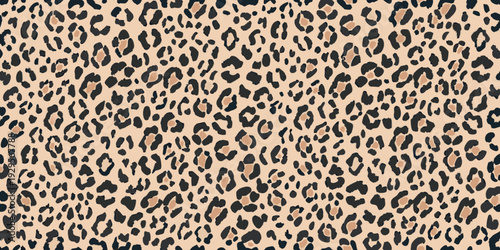 A seamless pattern of dark leopard spots on a light beige background