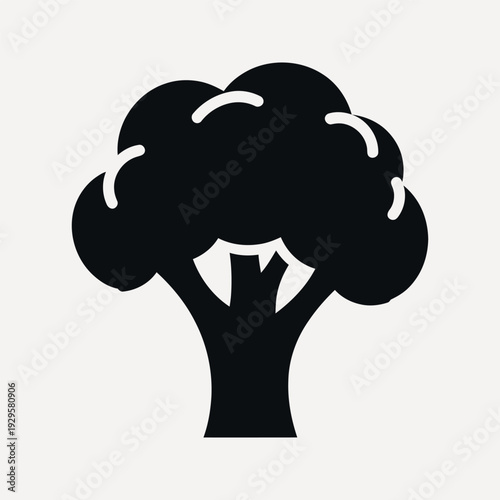 Black silhouette of a broccoli floret with a thick stem on a light grey background vegetable