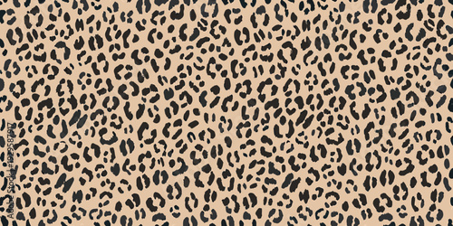 Seamless pattern of dark leopard spots on a light beige background