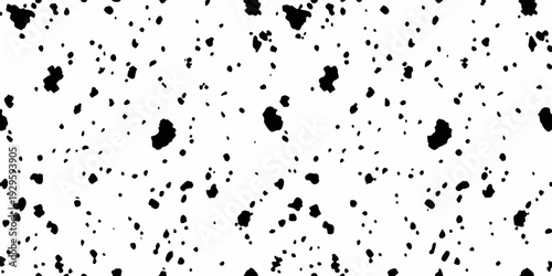 Abstract black blots and splatters against a clean white background