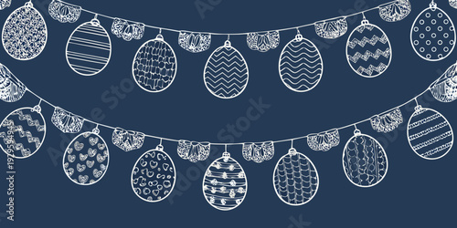 A string of decorative easter eggs with various patterns hangs across the frame