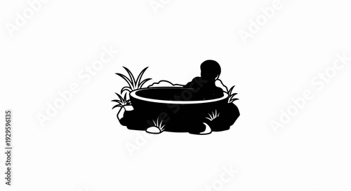 A black silhouette of a hot tub with a curved rim and plants around its rocky base