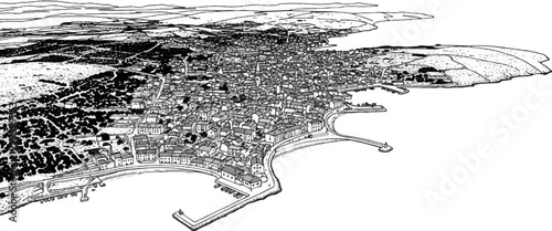 Aerial view of a densely populated coastal town with a natural harbor