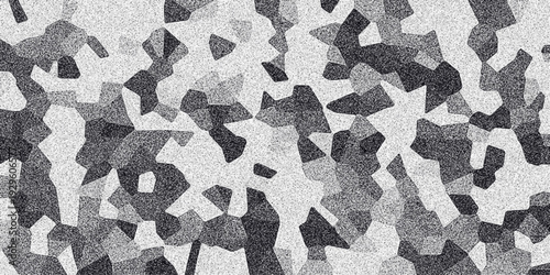 Abstract monochrome mosaic pattern of irregular geometric shapes in varying shades of gray and white with a subtle grainy texture, creating a modern visual design