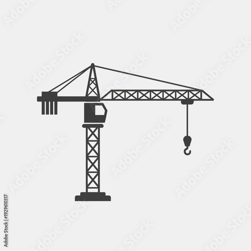 Construction crane lifting heavy load on building site, industrial equipment, heavy machinery