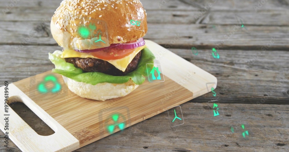 Fototapeta premium Displaying burger sitting on cutting board on weathered wood table, showing floating green AR icons