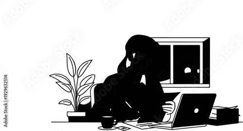 Person working on a laptop at a desk with a plant and coffee