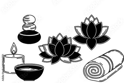 Serene spa symbols stacked stones, lit candle, bowl, lotus flowers, rolled towel