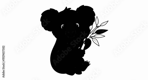 Cute black silhouette of a koala holding a eucalyptus branch with leaves