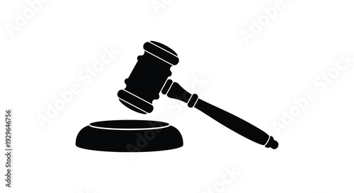 A stark black silhouette depicts a gavel resting on a sound block symbolizing law and judicial proceedings silhouette