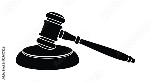 A striking black silhouette of a gavel resting upon a sound block symbolizing legal justice and order silhouette