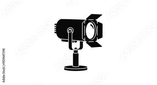 A striking black silhouette depicts a vintage film camera on a stand evoking a sense of classic filmmaking silhouette