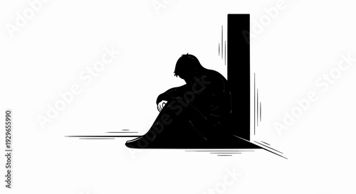 Silhouette of a person sitting alone in a dark corner, looking down