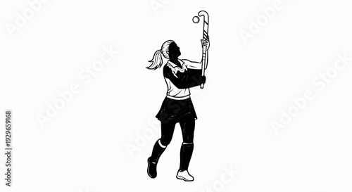 Silhouette of a female field hockey player about to strike a ball with her stick