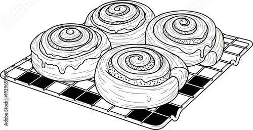 Four frosted cinnamon rolls with visible swirls and filling rest on a cooling rack
