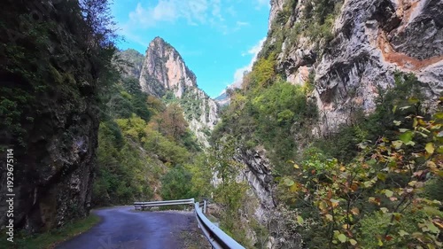 Driving through the Anisclo Canyon in Spain. One of the most spectacular landscapes in Aragon, a deep gorge carved over centuries by the intense erosion of the Bellos River in the Pyrenees mountains