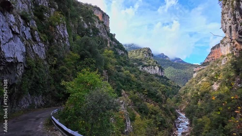 Driving through the Anisclo Canyon in Spain. One of the most spectacular landscapes in Aragon, a deep gorge carved over centuries by the intense erosion of the Bellos River in the Pyrenees mountains