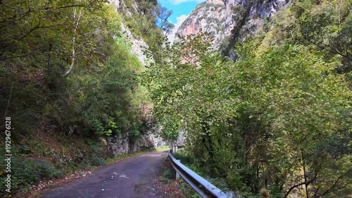 Driving through the Anisclo Canyon in Spain. One of the most spectacular landscapes in Aragon, a deep gorge carved over centuries by the intense erosion of the Bellos River in the Pyrenees mountains