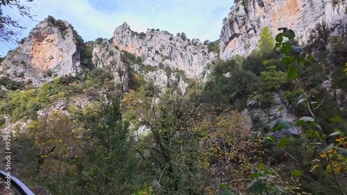 Driving through the Anisclo Canyon in Spain. One of the most spectacular landscapes in Aragon, a deep gorge carved over centuries by the intense erosion of the Bellos River in the Pyrenees mountains