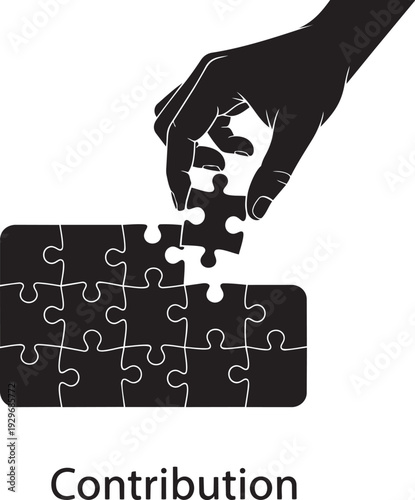 Hand placing the final puzzle piece into a completed puzzle, symbolizing contribution, teamwork, and problem-solving.