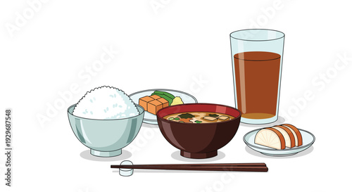 Traditional Japanese meal set consisting of a bowl of white rice, miso soup, side dishes, pickles, and a glass of tea.