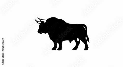 Silhouette of a muscular black bull with large horns, standing on a white background