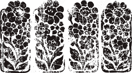 Vintage floral patterns with ornamental flowers, leaves, and stems in black and white design blocks