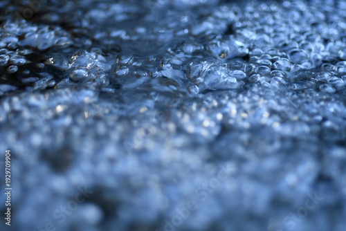 beautiful water blue  bubbles  in natural spring water background  macro shot