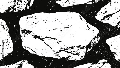 Close up of irregular white stones embedded in dark rough textured surface