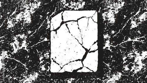 cracked white rectangular surface on rough textured black background with grunge