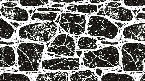 Black and white cracked stone wall pattern texture with rough irregular shapes and solid stone blocks