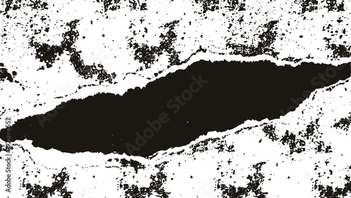 Ripped torn paper hole with rough edges on grunge textured background