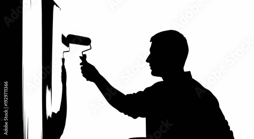 Craftsman at Work: A painter meticulously applies a fresh coat of paint to a wall, embodying the precision and dedication of skilled craftsmanship. 